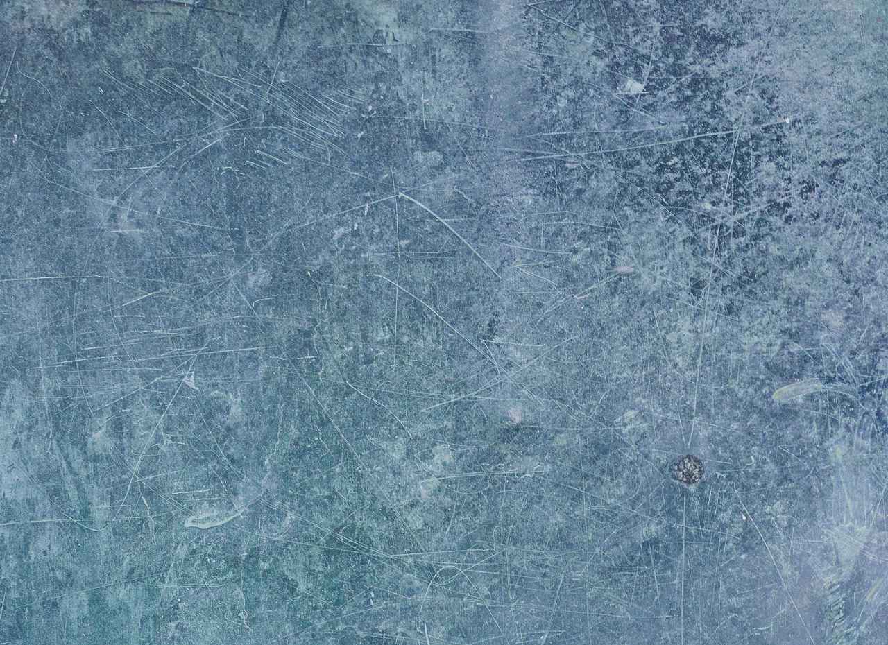 blue-scratched-metal-sheet-free-texture