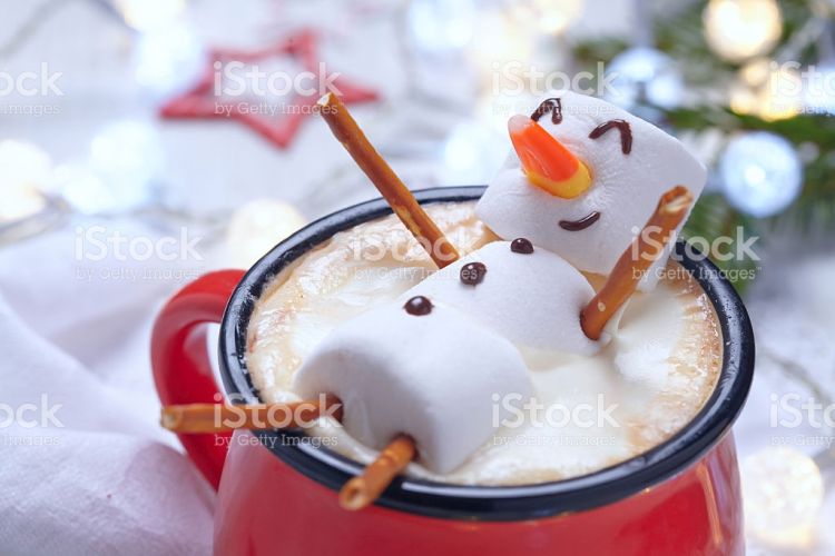 Hot Chocolate with Melted Snowman - Stock Image